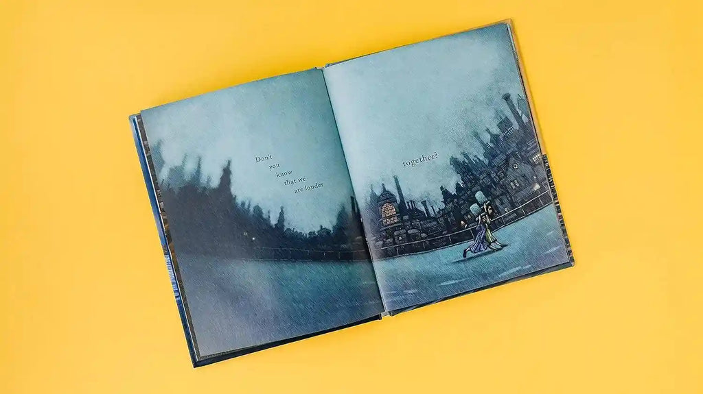 Open book with blue illustrations on a yellow background