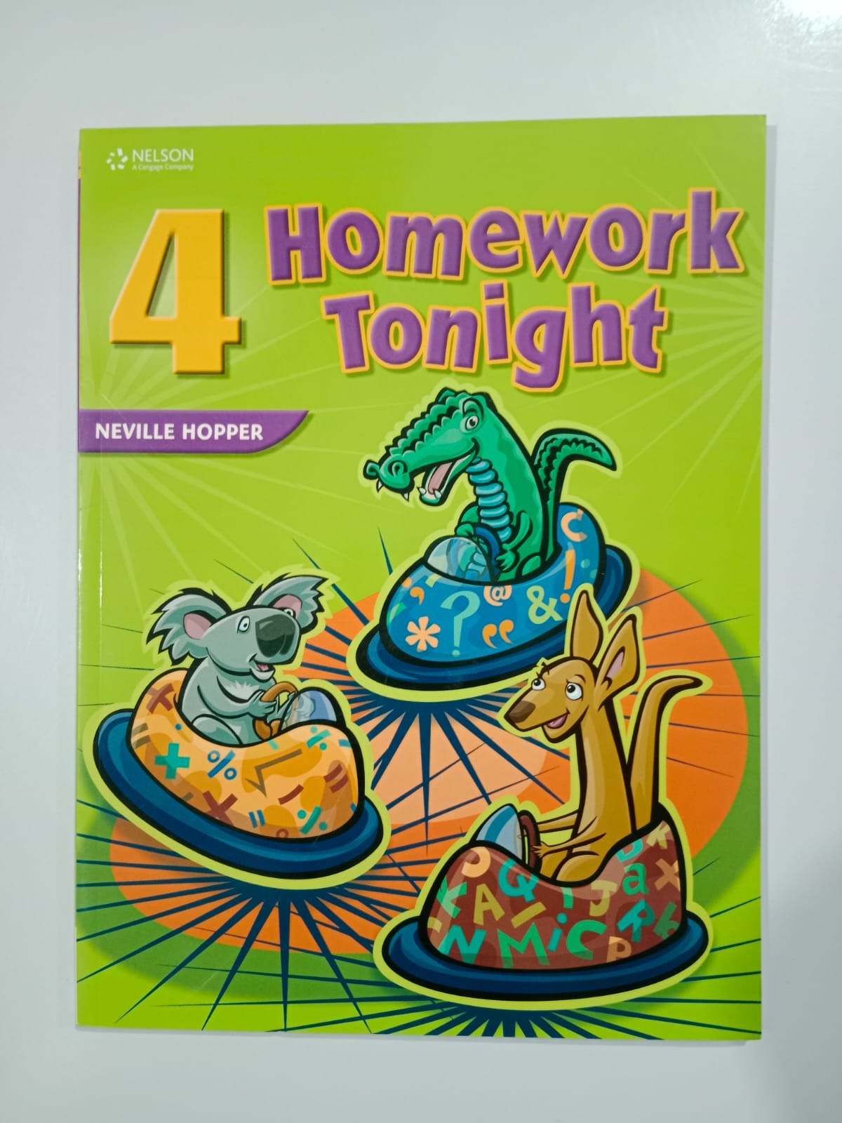 Book cover of '4 Homework Tonight' with cartoon animals and colorful design on a green background