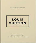 Beige book cover with 'Louis Vuitton' branding and text